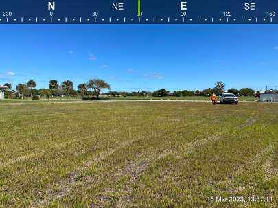 CREW AND TRUCK AT VACANT LOT FOR TOPOGRAPHIC SURVEY